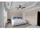 Cozy bedroom with a plush bed, soft carpet, and large windows with natural light at 2281 Millhaven Se St # 18, Smyrna, GA 30080