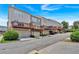 Exterior view of townhome community with garages and manicured landscaping, offering a sense of community at 2281 Millhaven Se St # 18, Smyrna, GA 30080