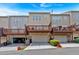 Rear view of townhomes with attached garages and private decks, blending convenience and outdoor living at 2281 Millhaven Se St # 18, Smyrna, GA 30080