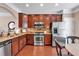 Modern kitchen featuring granite counters, stainless steel appliances, and ample cabinet space at 2281 Millhaven Se St # 18, Smyrna, GA 30080