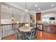 Kitchen and breakfast nook with stainless appliances and pendant lighting at 2281 Millhaven Se St # 18, Smyrna, GA 30080