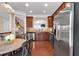 Gourmet kitchen with stainless steel appliances, breakfast nook, and hardwood floors at 2281 Millhaven Se St # 18, Smyrna, GA 30080