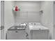 Laundry room with modern washer and dryer units at 2281 Millhaven Se St # 18, Smyrna, GA 30080