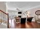 Spacious living room featuring hardwood floors, a fireplace, and an abundance of natural light at 2281 Millhaven Se St # 18, Smyrna, GA 30080