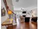 Open-concept living room with hardwood floors, fireplace, and plenty of natural light at 2281 Millhaven Se St # 18, Smyrna, GA 30080