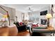 Inviting living room featuring hardwood floors, a fireplace, and an abundance of natural light at 2281 Millhaven Se St # 18, Smyrna, GA 30080