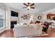 Bright living room featuring a fireplace, large TV, and comfortable seating at 2281 Millhaven Se St # 18, Smyrna, GA 30080