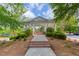 Enjoy the outdoors at the community gazebo, landscaped with trees and flowerbeds at 326 Oakview Way, Canton, GA 30114