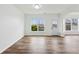 Open living room with hardwood floors, lots of natural light, and modern interior finishes at 326 Oakview Way, Canton, GA 30114