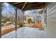 Covered patio area with views of the landscaped backyard at 326 Oakview Way, Canton, GA 30114