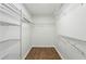 Walk-in closet with ample shelving units at 326 Oakview Way, Canton, GA 30114