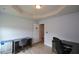 A well-lit office features hardwood floors, two desks, and a neutral color scheme at 917 Revere Way, Hampton, GA 30228