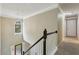 Entry foyer featuring natural light, hardwood floors, and access to the upper level at 135 Clubhouse Nw Dr, Kennesaw, GA 30144