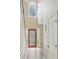 Bright foyer features a soaring ceiling, a leaded glass front door, and hardwood floors at 135 Clubhouse Nw Dr, Kennesaw, GA 30144