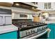Close up on the stainless steel oven and cooktop in the kitchen area at 135 Clubhouse Nw Dr, Kennesaw, GA 30144