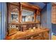 Antique built in bar area with ornate mirror and brass sink at 550 Atlanta Country Club Se Dr, Marietta, GA 30067