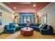 Basement media room featuring a large sectional sofa and unique decor for relaxing and entertaining at 550 Atlanta Country Club Se Dr, Marietta, GA 30067