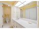Bright bathroom features a large countertop, cabinet, and plenty of storage at 550 Atlanta Country Club Se Dr, Marietta, GA 30067
