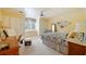 Sunlit bedroom features custom cabinets, sitting area and traditional decor at 550 Atlanta Country Club Se Dr, Marietta, GA 30067