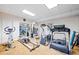 Bright home gym equipped with modern exercise machines for a complete workout routine at 550 Atlanta Country Club Se Dr, Marietta, GA 30067