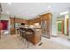 Spacious kitchen featuring a center island with bar seating, stainless steel appliances, and ample cabinetry at 550 Atlanta Country Club Se Dr, Marietta, GA 30067