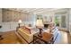 Charming living room with hardwood floors, decorative fireplace, neutral furniture, and elegant decor at 550 Atlanta Country Club Se Dr, Marietta, GA 30067