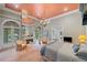 Spacious bedroom with sitting area, fireplace, balcony access and backyard views at 550 Atlanta Country Club Se Dr, Marietta, GA 30067