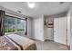 Bedroom with window, closet, neutral decor at 607 Lexington Way, Woodstock, GA 30189