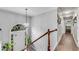Entryway featuring a view to the front door, chandelier, and hardwood floors at 607 Lexington Way, Woodstock, GA 30189