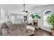Cozy living room with a stone fireplace, hardwood floors, and vaulted ceilings at 607 Lexington Way, Woodstock, GA 30189