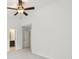 Minimalist bedroom with ceiling fan, closet, and en-suite bath at 106 Weatherstone Square Drive, Woodstock, GA 30188