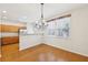 Cozy dining area with chandelier and natural light at 106 Weatherstone Square Drive, Woodstock, GA 30188