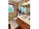 Bathroom with a vanity and mirror, and a neutral color palette at 21 Picketts Ridge Ln, Acworth, GA 30101