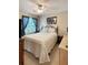 Bedroom with ceiling fan, natural light from window, and art on the wall at 21 Picketts Ridge Ln, Acworth, GA 30101