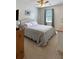 Cozy bedroom featuring a neutral color palette and natural light from the window at 21 Picketts Ridge Ln, Acworth, GA 30101