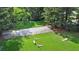 Overhead view of community amenities including horseshoe pits and a fenced volleyball court, offering recreational activities at 21 Picketts Ridge Ln, Acworth, GA 30101