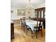 Elegant dining room featuring hardwood floors, a chandelier, and ample space for entertaining guests at 21 Picketts Ridge Ln, Acworth, GA 30101