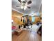 Basement gym with workout equipment, wood paneling, and a ceiling fan at 21 Picketts Ridge Ln, Acworth, GA 30101
