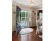 Welcoming foyer features hardwood floors, an elegant front door, and a view to the front porch at 21 Picketts Ridge Ln, Acworth, GA 30101