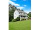 Charming two-story home with a welcoming front porch and well-manicured lawn at 21 Picketts Ridge Ln, Acworth, GA 30101