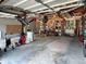 Spacious garage with storage racks and ample room for parking and projects at 21 Picketts Ridge Ln, Acworth, GA 30101