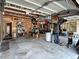 Spacious garage with ample storage shelving and a well-organized tool area at 21 Picketts Ridge Ln, Acworth, GA 30101