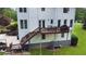 Back of the house with a deck, patio, and well-maintained lawn at 21 Picketts Ridge Ln, Acworth, GA 30101