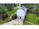 Aerial view of a well-maintained home, showcasing a large yard, deck, and two car garage at 21 Picketts Ridge Ln, Acworth, GA 30101