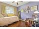 Cozy bedroom with wood floors, ample natural light, and charming decor at 3839 Brookcrest Cir, Decatur, GA 30032