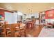 Open kitchen with white cabinets, stainless steel appliances, and dining area at 3839 Brookcrest Cir, Decatur, GA 30032