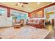 Cozy living room with hardwood floors, colorful walls, and ample natural light, creating an inviting space at 3839 Brookcrest Cir, Decatur, GA 30032
