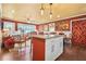 Open-concept kitchen and living area with warm-toned walls, hardwood floors, and a seamless flow for entertaining at 3839 Brookcrest Cir, Decatur, GA 30032