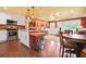 Bright, open floorplan with a kitchen, dining area, and living room, all seamlessly connected for modern living at 3839 Brookcrest Cir, Decatur, GA 30032