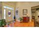 Welcoming foyer with hardwood floors, a decorative front door, and a view into the home at 410 Fitzgerald Ln, Fayetteville, GA 30215